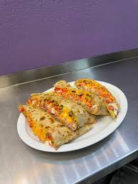 Sayulitas signature dishes Pacman FriesCarne Asada FriesHot Cheeto Quesadilla